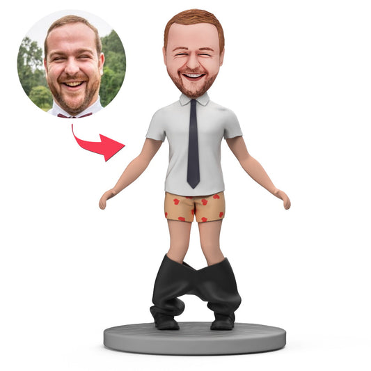Funny man-in-trousers personalised bobblehead in polymer clay with customisable head and engraved text on base, ideal personalised gift