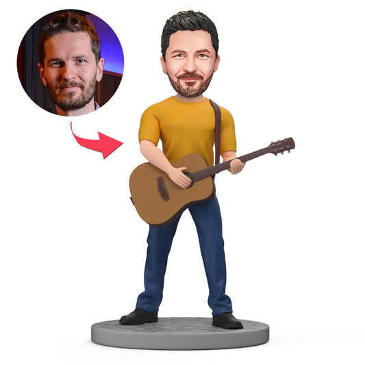 Personalised male singer with guitar bobblehead in polymer clay, hand-finished with customised head and engraved base – perfect personalised musician gift