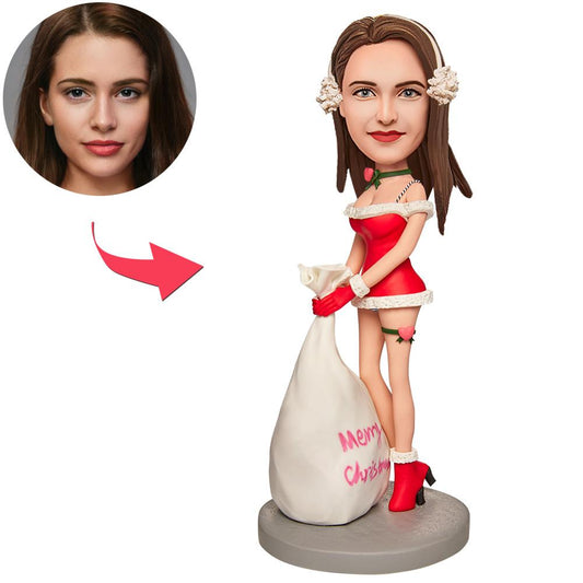 Personalised polymer clay Christmas girl bobblehead with engraved name plaque, customised face and hairstyle – quirky seasonal gift and stocking filler for UK and Australia