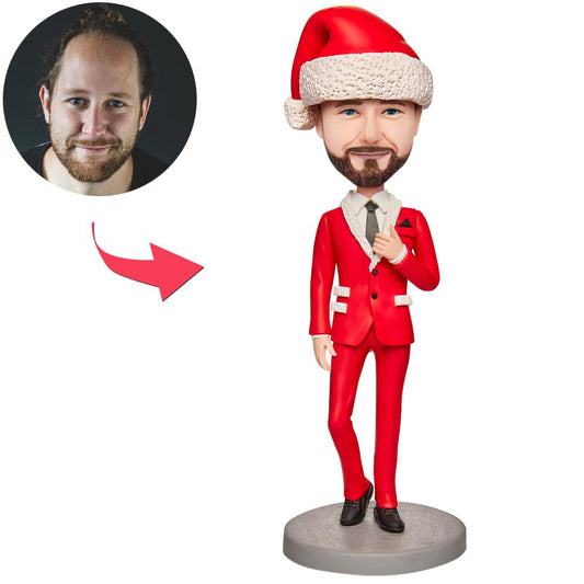 Personalised Christmas boy bobblehead in a red festive suit with engraved base – handcrafted polymer clay custom-face bobblehead gift for kids, dads and grandparents
