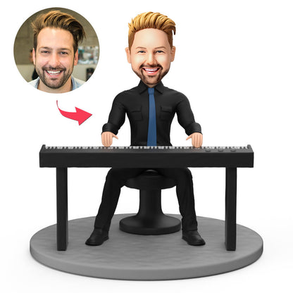 Handsome male keyboard player personalised bobblehead in polymer clay with engraved base — custom head modelled from your photos, perfect musician gift