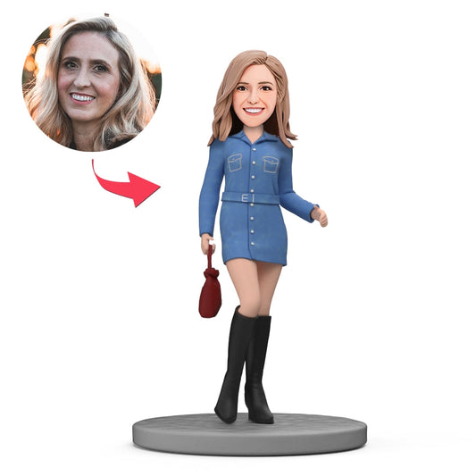 Personalised denim skirt bobblehead – custom polymer clay figurine of a fashion lady in a denim skirt and black boots with engraved text on the base, ideal personalised bobblehead gift (UK & Australia)