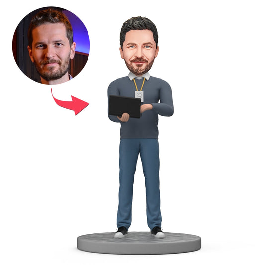 Custom software engineer bobblehead with personalised head from your photo, handcrafted polymer clay figure holding a laptop and ID badge, perfect personalised desk ornament for developers