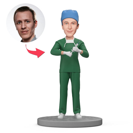 Front view of custom anaesthetist bobblehead holding a syringe, personalised polymer clay face gift with engraved text — ideal doctor thank you gift