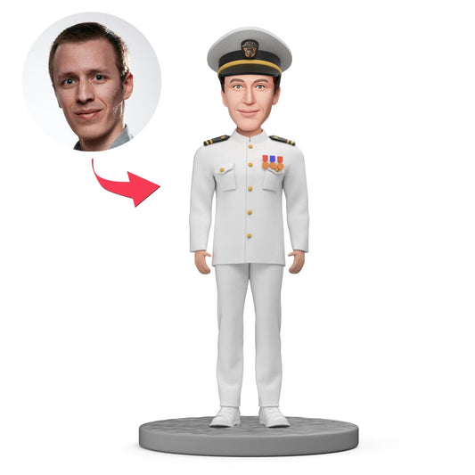 Personalised navy bobblehead of a naval officer in uniform with engraved base text — head-only customisation from your photos, polymer clay desk keepsake ideal for military graduations and promotions