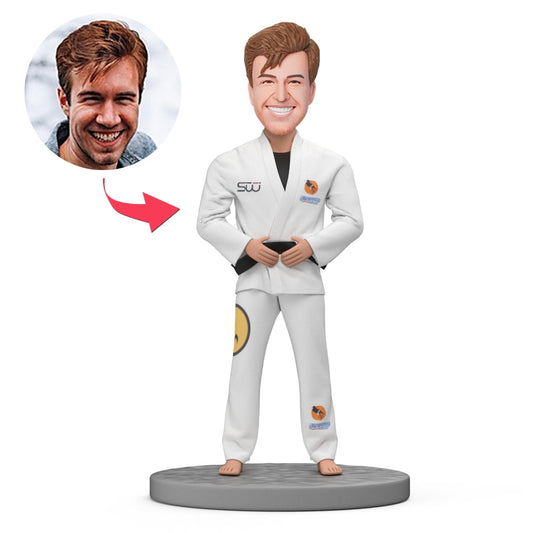 Personalised Karate & Taekwondo bobblehead in white martial arts uniform with black belt — custom polymer clay figurine for athlete, coach or martial arts enthusiast