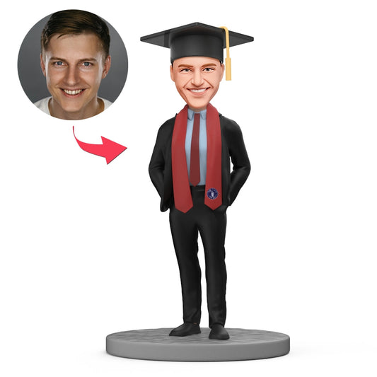Personalised graduation bobblehead of a male graduate in a suit with a colour-customisable red stole — handmade polymer clay keepsake with photo-customised head, ideal graduation gift