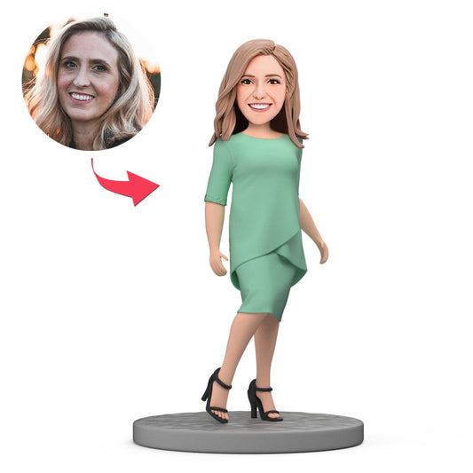 Personalised Mother's Day bobblehead of a fashion Mum in a green dress – handcrafted polymer clay custom bobblehead with personalised head (hairstyle and expression), ideal keepsake gift for Mum in the UK and Australia