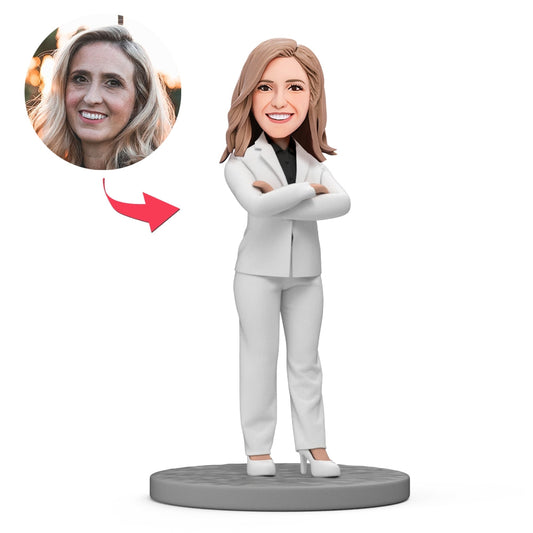 Personalised bobblehead lady boss in white suit — handcrafted polymer clay figure with custom head matched to your photo, perfect Boss's Day gift for mentor or colleague