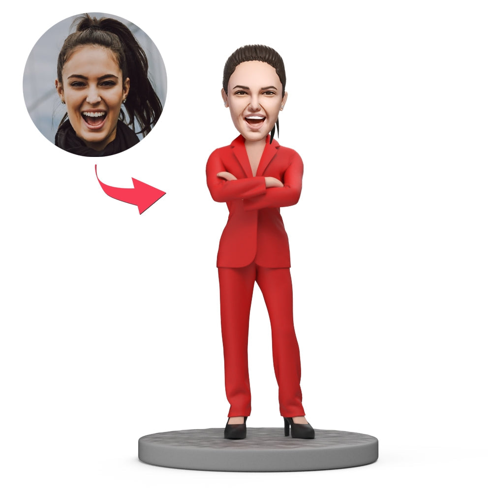 Personalised polymer clay bobblehead of a businesswoman in a red suit (standing) — handcrafted Boss's Day corporate gift for her