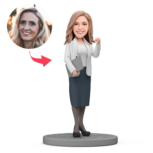 Personalised Businesswoman Bobblehead custom-face polymer clay figurine of a businesswoman holding documents, ideal personalised gift for her and office desk ornament