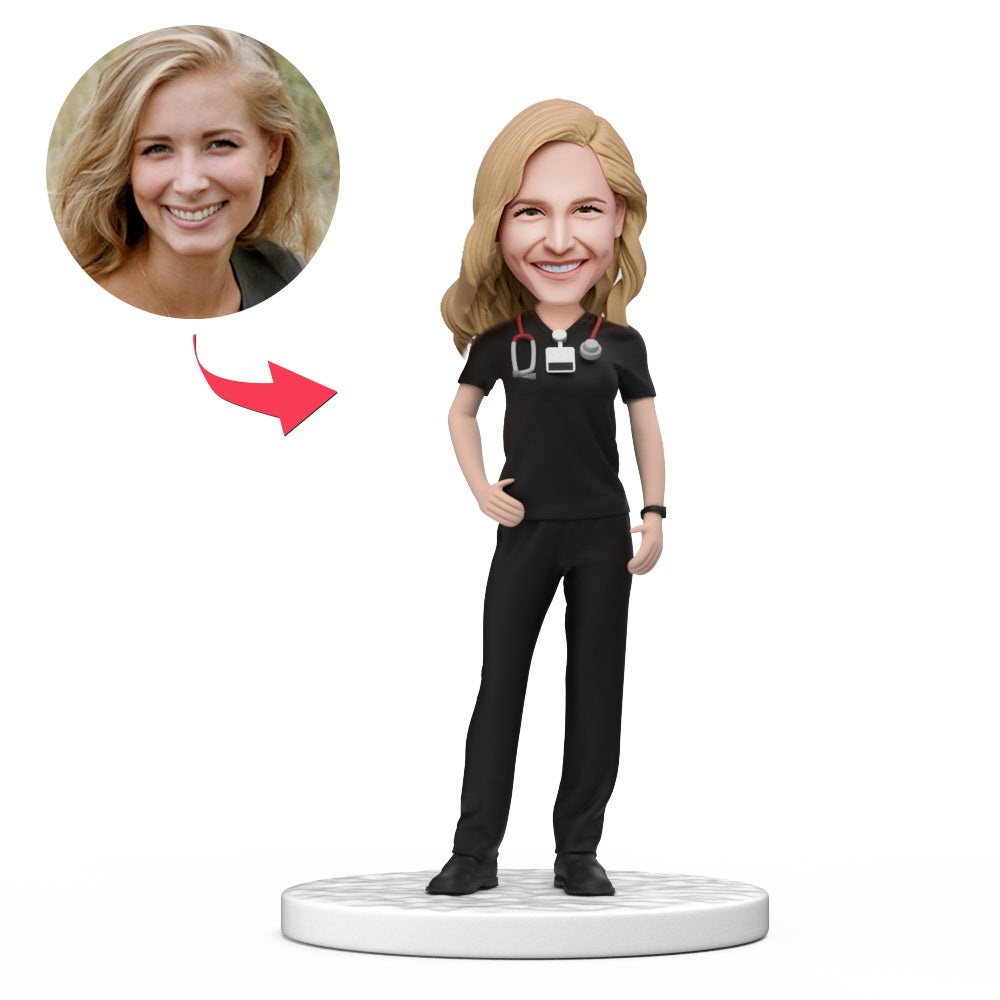 Personalised female doctor bobblehead in black scrubs with engraved base, handmade polymer clay custom face doll – ideal personalised doctor gift and graduation keepsake