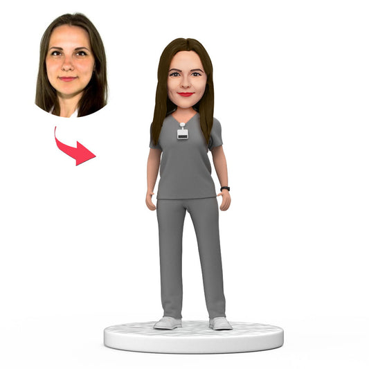 Personalised female doctor bobblehead in grey scrubs with custom face and engraved base – handcrafted polymer clay National Doctor’s Day gift, perfect desk ornament
