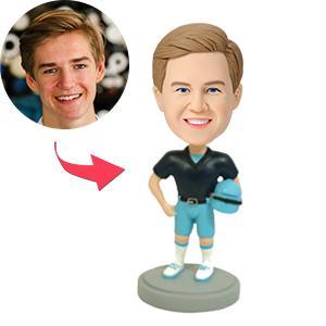 Front view of a personalised jockey bobblehead in polymer clay wearing an engraved helmet and racing silks — customised head likeness, ideal personalised jockey gift and customised horse racing bobblehead.