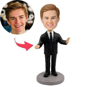 Front view of personalised male executive public speaker polymer clay bobblehead with engraved name on the base — custom executive bobblehead and personalised corporate speaker gift