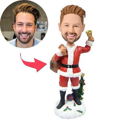 Personalised polymer clay Christmas bobblehead for men with custom head and engraved text on the base, ideal personalised gift for him