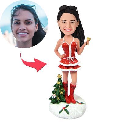 Personalised Christmas bobblehead of a sexy woman ringing a bell – custom polymer clay head matched to your photo with engraved base text