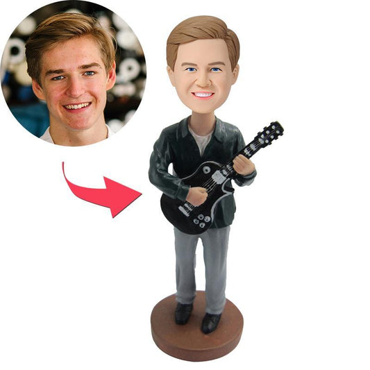 Personalised guitarist bobblehead (polymer clay) – custom musician figurine with engraved text on the base; head personalised from a photo