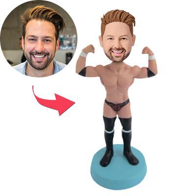 Custom male stripper bobblehead with personalised engraved text on the base — handcrafted polymer clay figurine with a custom-made head from your photo, ideal novelty gift for bachelor parties and stag dos