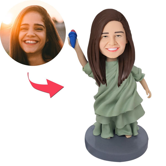 Personalised Statue of Liberty bobblehead with custom head and engraved text, high-detail polymer clay keepsake and photo-to-bobblehead gift