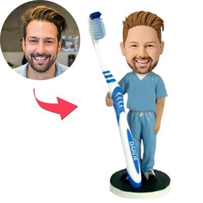 Personalised male dentist bobblehead holding a toothbrush – custom bobblehead with engraved text, hand-sculpted polymer clay keepsake ideal as a personalised dentist gift