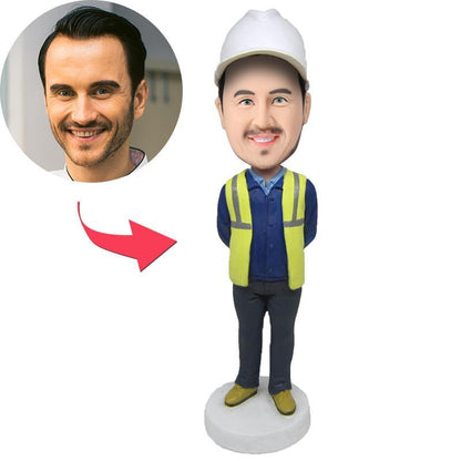 Personalised construction worker bobblehead — hand-crafted polymer clay figure with an engraved name on the base, custom head made from your photo