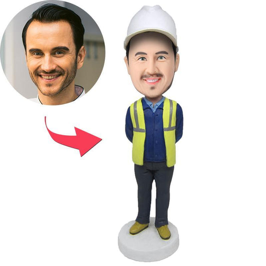 Personalised construction worker bobblehead — hand-crafted polymer clay figure with an engraved name on the base, custom head made from your photo