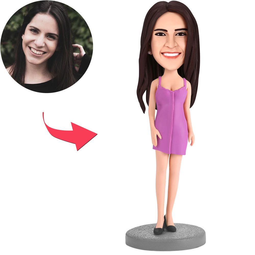 Custom woman bobblehead wearing a purple skirt – personalised polymer clay figure with a customised head and engraved text on the base