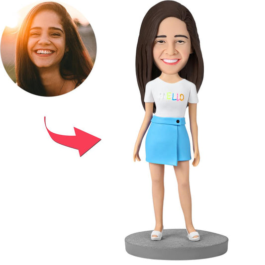 Personalised fashion girl bobblehead in blue skirt — polymer clay figurine with customised head and engraved text on base, ideal gift for UK & Australia
