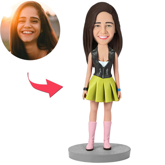 Custom female polymer clay bobblehead in green dress with engraved base and personalised head likeness — bespoke bobblehead, engraved bobblehead gift