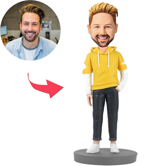 Personalised fashion man bobblehead in a yellow hoodie — polymer clay custom bobble head with a customised head based on your photo and engraved base text, ideal personalised gift