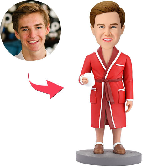 Personalised modern man holding a mug bobblehead with engraved text, handcrafted polymer clay figure with a custom head created from your photo, front view