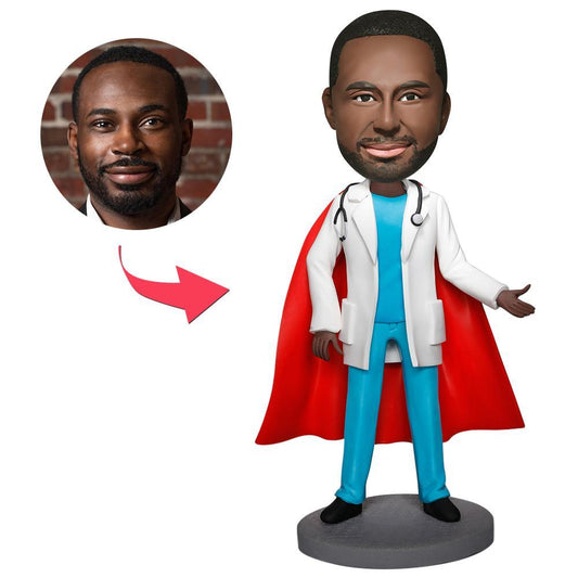 Personalised Super Doctor bobblehead with engraved stethoscope plaque — custom head only, hand-sculpted polymer clay doctor figurine ideal as a personalised doctor gift
