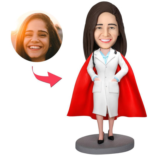 Personalised female doctor bobblehead in a white coat, polymer clay figurine with a customised head from your photo and engraved text on the base — ideal personalised doctor gift