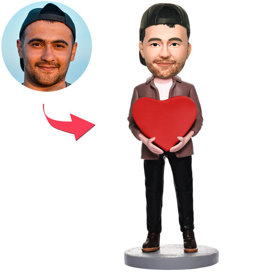 Personalised man with heart bobblehead in polymer clay — custom head with chosen hairstyle, preset body; perfect personalised wedding or Valentine’s gift