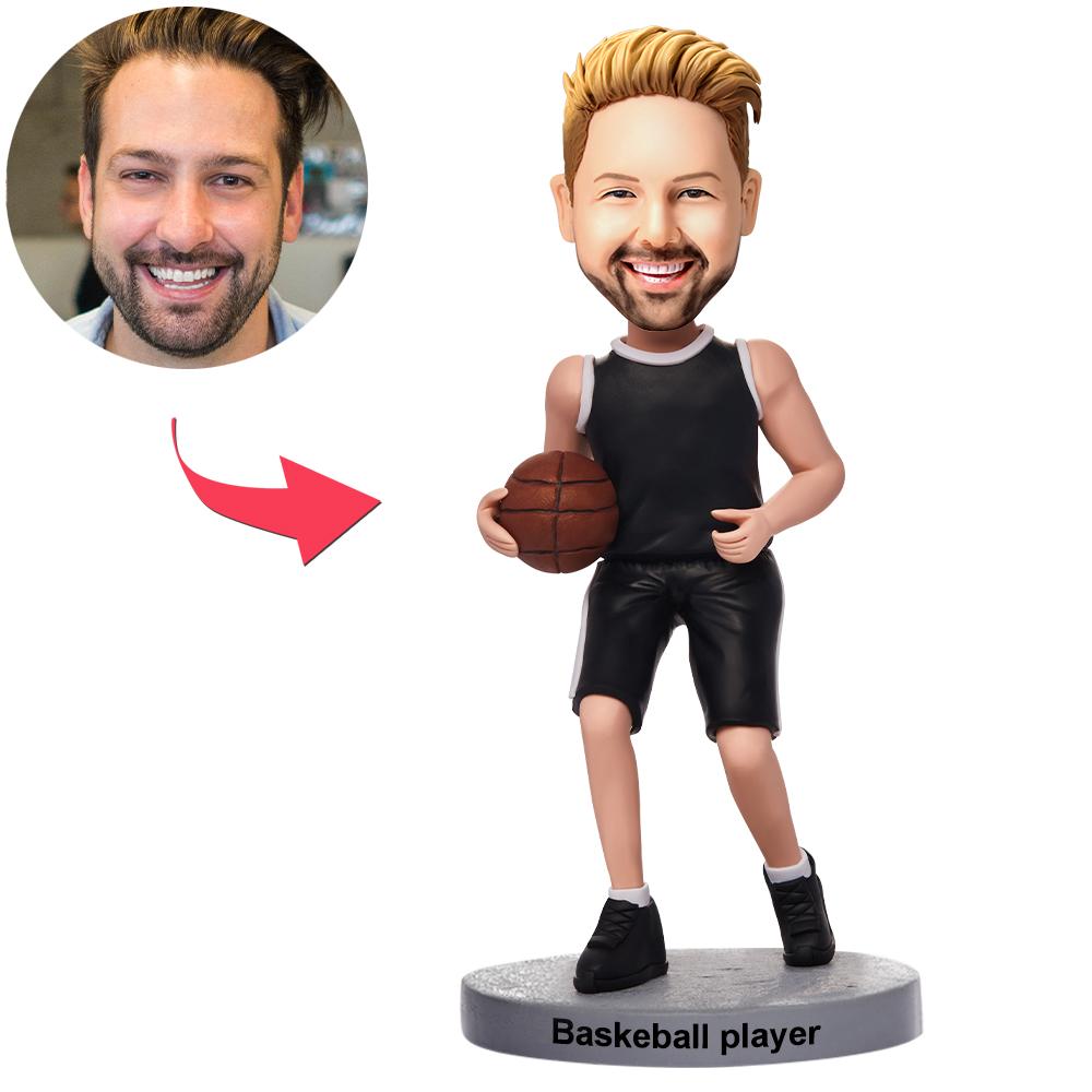Personalised dribbling basketball player bobblehead in black kit — handcrafted polymer clay figure with custom head from your photo and engraved text on the base