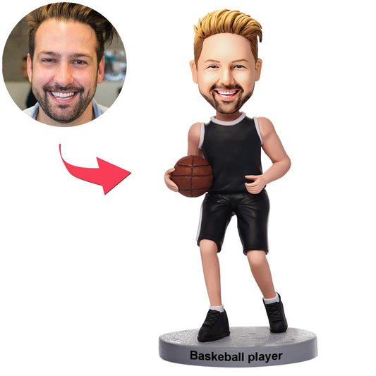Personalised dribbling basketball player bobblehead in black kit — handcrafted polymer clay figure with custom head from your photo and engraved text on the base