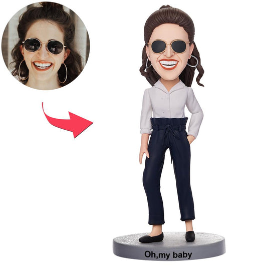 Front view of custom casual beautiful girl bobblehead in polymer clay with personalised engraved text on base
