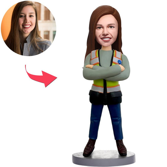Personalised female worker bobblehead in polymer clay with customised head and engraved base text, handcrafted likeness ideal as a personalised bobblehead gift