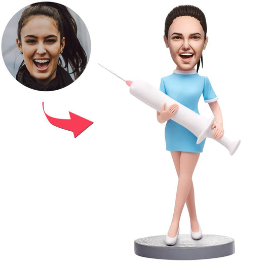 Personalised nurse bobblehead in blue scrubs with engraved text — custom photo face on premium polymer clay figure, ideal thank‑you or get‑well gift for nurses