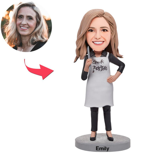 Personalised female chef bobblehead — handcrafted polymer clay figurine with custom head modelled from your photo and engraved text on the base
