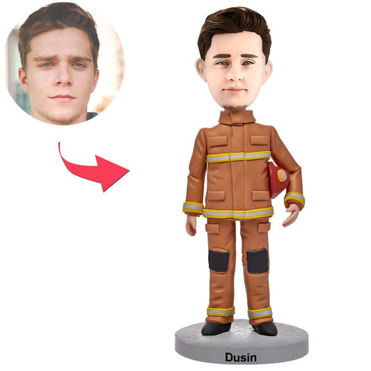 Personalised male firefighter bobblehead in uniform with engraved text on base, polymer clay customised head matched to photo, front view ideal personalised firefighter gift