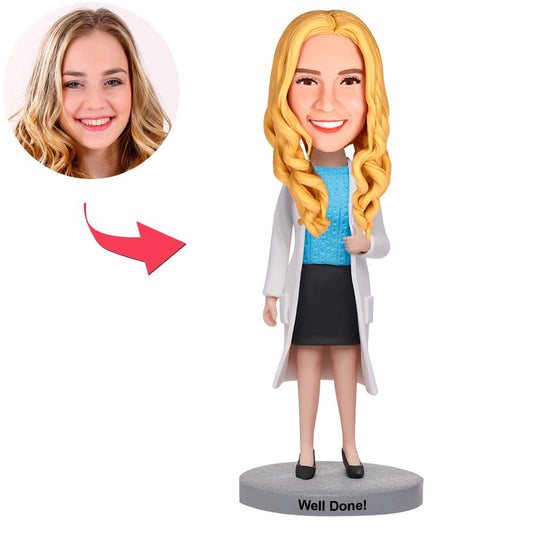 Personalised female doctor bobblehead with engraved base — polymer clay custom head, white coat and stethoscope; ideal gift for GPs, nurses and medical graduates