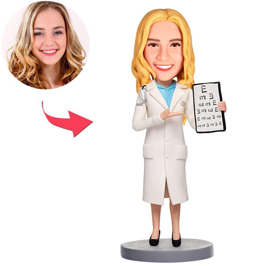 Personalised ophthalmologist bobblehead in hand-sculpted polymer clay with customised head likeness and engraved text on the base — ideal ophthalmologist gift, doctor bobblehead personalised.