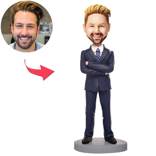 Personalised blue suit businessman bobblehead — polymer clay figurine with customised head and engraved base text, ideal corporate gift and desk ornament