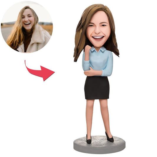 Personalised business female bobblehead in blue shirt, polymer clay figurine with customised head and engraved base perfect as a corporate desk gift