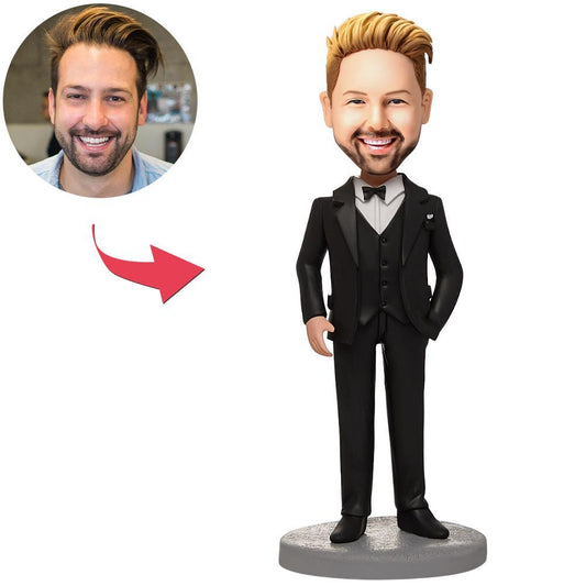 Personalised business man bobblehead in a black suit with a customised face and optional engraved text on the base — bespoke custom business man bobblehead gift for bosses, corporate awards and office desk ornaments in the UK and Australia
