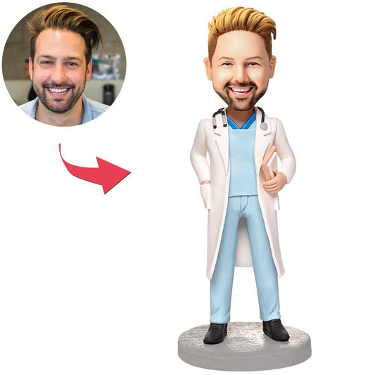 Custom Doctor Bobblehead male GP with stethoscope, personalised head from your photo and engraved text on base, hand-sculpted polymer clay medical graduation gift