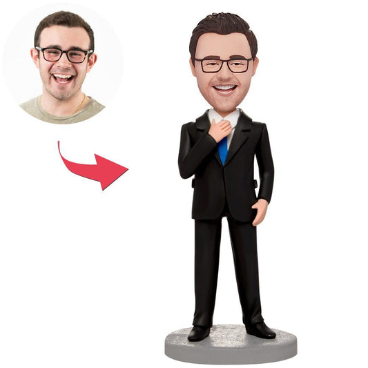 Custom business man bobblehead with engraved tie, personalised head in polymer clay — front view of suited figure showing facial likeness and name engraving, ideal corporate gift