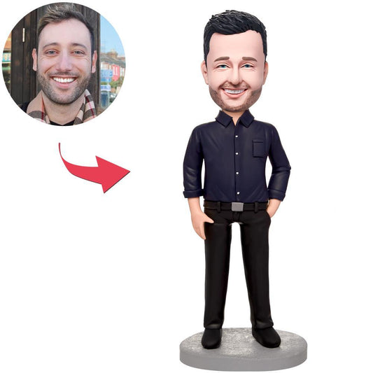 Handmade custom businessman bobblehead in a black suit with engraved base plaque, personalised head sculpt from your photos, polymer clay desk figurine — ideal corporate bobblehead gift and custom bobblehead Australia / personalised bobble head UK